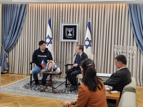 Israeli President Isaac Herzog meets Bernie Galsim Lavarias, the widower of Mary Ann V. De Vera, who was killed in an Iranian missile strike on Tel Aviv on the first day of “Operation Roaring Lion,” March 12, 2026. Photo by Sharon Altshul.