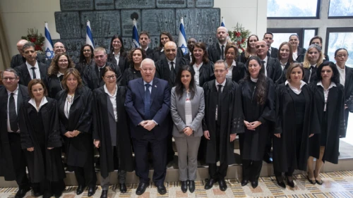 Israeli Justice Minister Ayelet Shaked , President Reuven Rivlin , Supreme Court President Esther Hayut poses for a picture with newly sweard in judges at the President's Residence in Jerusalem, on Jan. 8, 2019. Photo by Noam Revkin Fenton/Flash90.