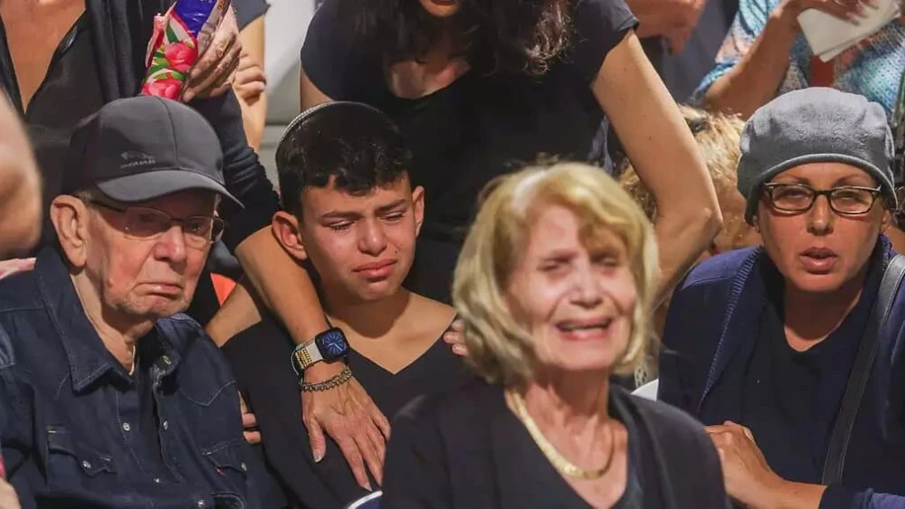 Yaniv Zohar at the funeral for his parents and sisters, Oct. 17, 2023. Photo by Yehoshua Yosef.