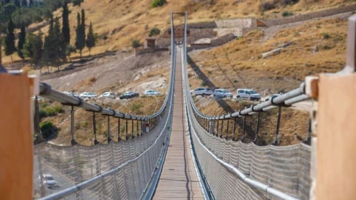 Jerusalem's new suspension bridge over the Hinnom Valley, as seen from Mount Zion. Credit: Eliyahu Yanai/City of David.