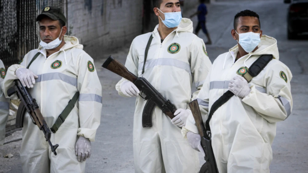 Palestinian security forces block the entrance to the Balata refugee camp near the Samarian city of Nablus on June 28, 2020. Photo by Nasser Ishtayeh/Flash90.