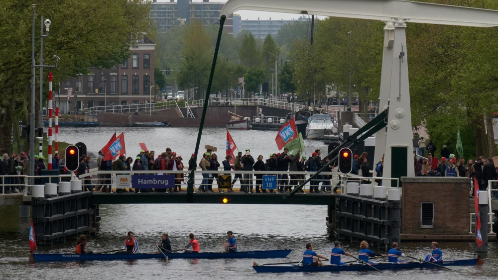 A procession crosses a bridge in Delft, the Netherlands on April 24, 2025. Photo by Pierre Crom/Getty Images.
