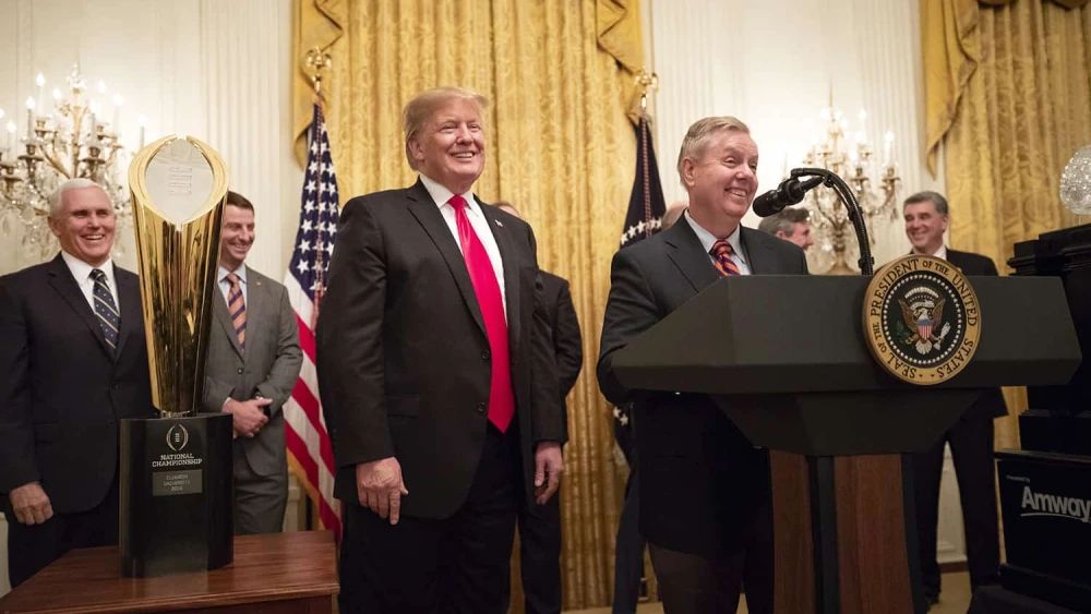 Sen. Lindsey Graham, joined by then-President Donald Trump, welcomes the national champion Clemson University Tigers football team to the White House, Jan. 14, 2019. Photo by Joyce N. Boghosian/The White House.