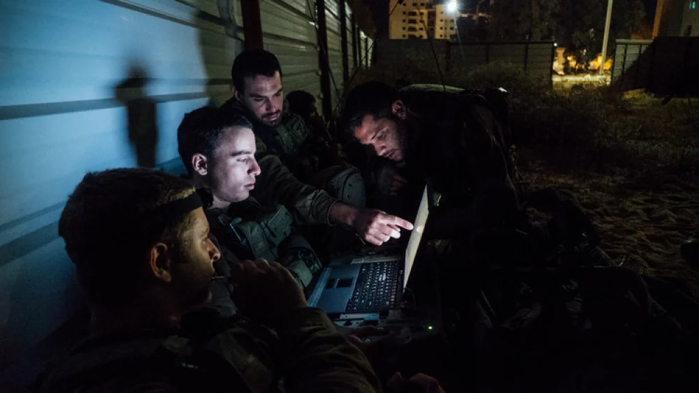 Artificial intelligence is being introduced at all levels of IDF decision-making. Pictured here, the Paratroopers Brigade during an exercise with other military units, including the elite canine unit Oketz. Credit: IDF via Flickr.
