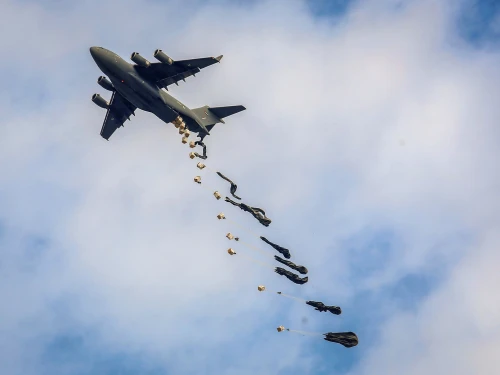 A plane drops aid loaded with food to Palestinians in the Gaza Strip, Oct. 17, 2024. Photo by Abed Rahim Khatib/Flash90.