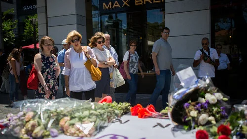 A makeshift memorial at the site of the June 2016 Palestinian terrorist shooting at Tel Aviv’s Sarona market. Four Israelis were killed in the attack. Credit: Miriam Alster/Flash90.