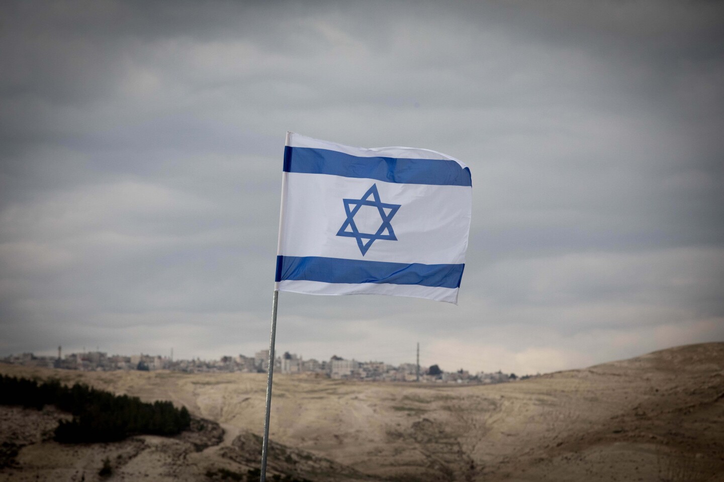 An Israeli flag in the E1 area of Ma'ale Adummim in Judea, Jan. 2, 2017. Photo by Yonatan Sindel/Flash90.