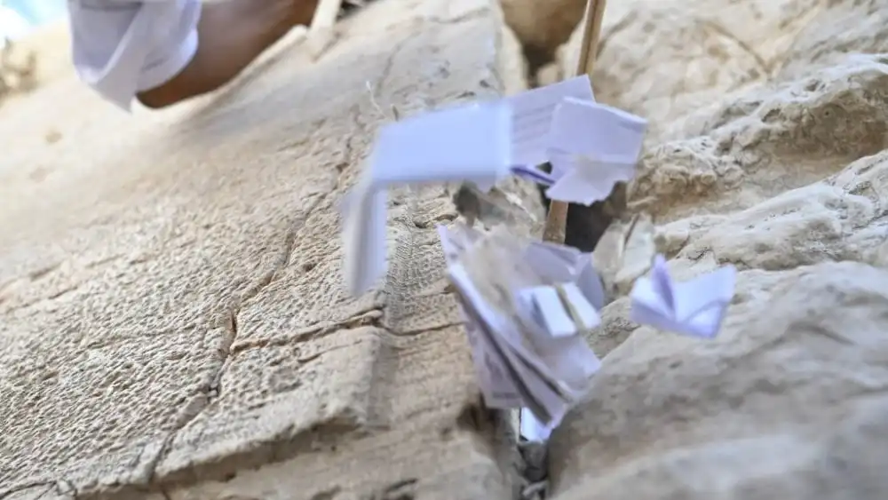 Notes are removed from the Western Wall ahead of Rosh Hashanah, Sept. 10, 2023. Photo by Yoav Dudkevitch/TPS.