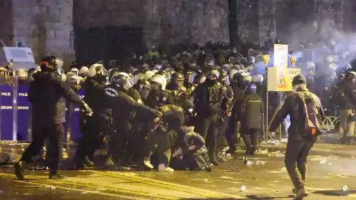 Police confront protesters as thousands of people demonstrate in front of the Istanbul Metropolitan Municipality in Sarachane Square against the arrest of Mayor Ekrem İmamoğlu, March 21, 2025. Photo by Sercan Ozkurnazli/dia images via Getty Images.