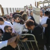 Members of the Reform movement and Hebrew Union College confront police and security guards while trying to enter a mixed men and women prayer area at the public square in front of the Western Wall in Jerusalem's Old City on Nov. 16, 2017.