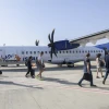 Passengers wearing protective face masks board an Israir flight to Eilat from Tel Aviv's Ben-Gurion International Airport, on May 13, 2020. Photo by Yossi Zeliger/Flash90.