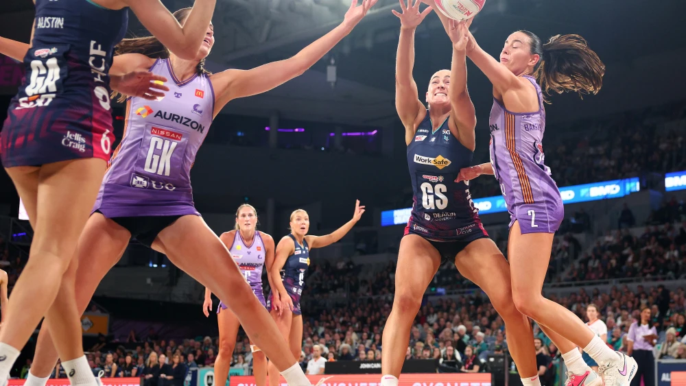 Sophie Garbin of the Vixens and Ruby Bakewell-Doran of the Firebirds contest the ball during the round nine Super Netball match between Melbourne Vixens and Queensland Firebirds at John Cain Arena, on May 10, 2026, in Melbourne, Australia. Photo by Daniel Pockett/Getty Images.