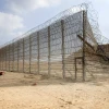A gap in the Gaza border fence created by invading terrorists on Oct. 7, 2023. Photo by Abed Rahim Khatib/Flash90.