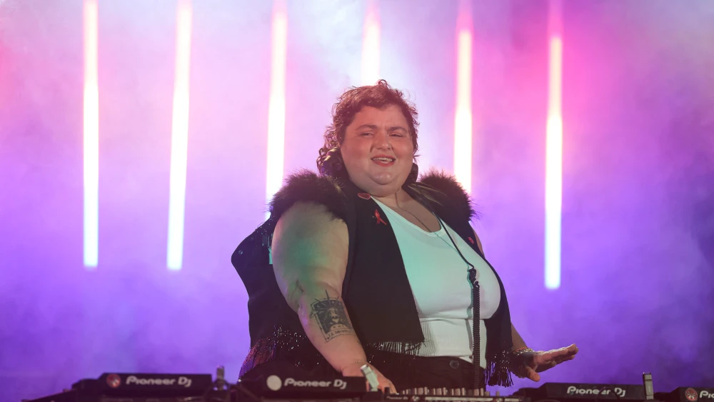 French DJ Barbara Butch performs during the Hameau Festival in Saint-Martin-du-Tertre, central France on July 25, 2026. Photo by Kenzo TRIBOUILLARD / AFP via Getty Images.