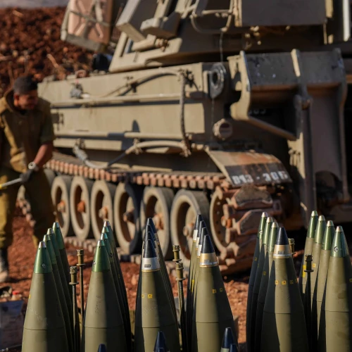 Israeli soldiers seen next to their artillery units near the Israeli border with Lebanon, northern Israel, Oct. 2, 2024. Photo by Ayal Margolin/Flash90.