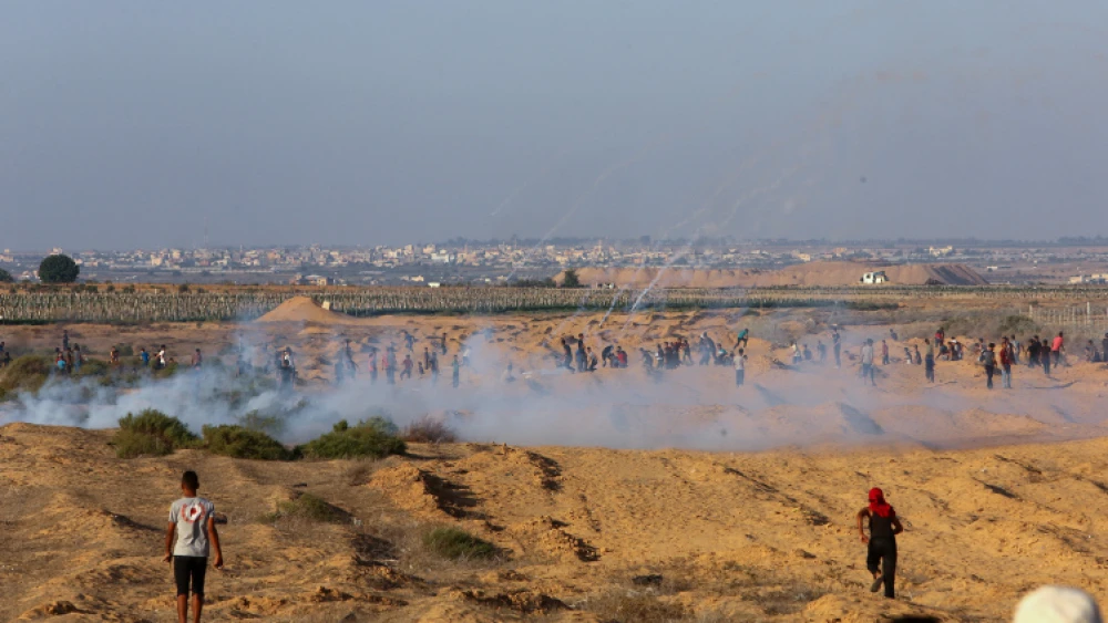 Palestinian protesters clash with Israeli forces following a demonstration along the border between Israel and Gaza, on Sept. 6, 2019. Photo by Abed Rahim Khatib/Flash90.