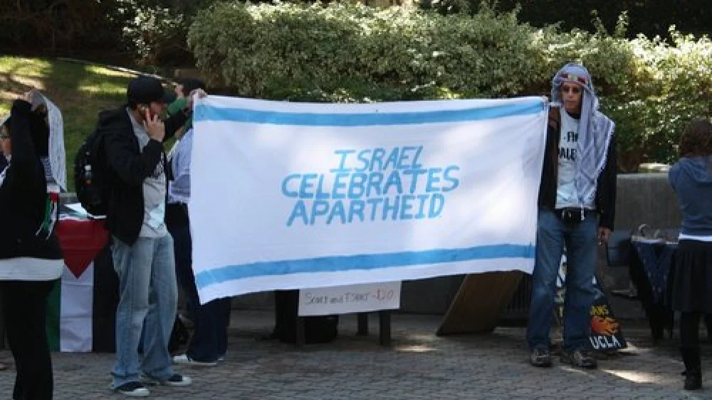 The cover page of the Committee for Accuracy in Middle East Reporting in America's (CAMERA) recently published monograph, “Indoctrinating Our Youth,” which describes how high schools in the Boston suburb of Newton have been using anti-Israel texts. Credit: CAMERA.