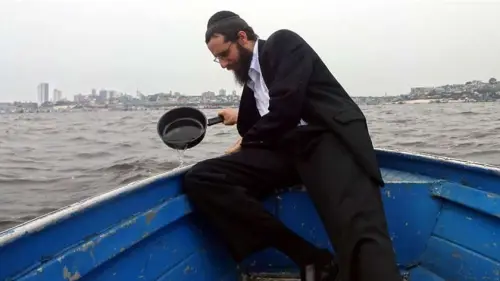When Rabbi Arieh Raichman was growing up in Texas, he never imagined that he would be koshering pots and pans in Brazil's Amazon River. Credit: Chabad.org/News.
