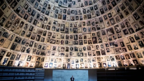 A security guard stands in the empty Hall of Names at the Yad Vashem Holocaust Memorial Museum in Jerusalem on April 19, 2020. Photo by Yonatan Sindel/Flash90.