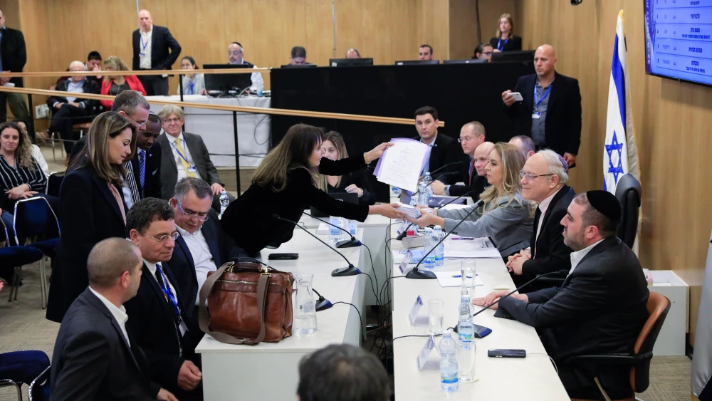 Likud Party members speak to press at the entrance of the election committee meeting where political parties running for a spot in the upcoming Israeli elections arrive to present their party list at the Knesset in Jerusalem, on Jan. 15, 2020. Photo by Olivier Fitoussi/Flash90.