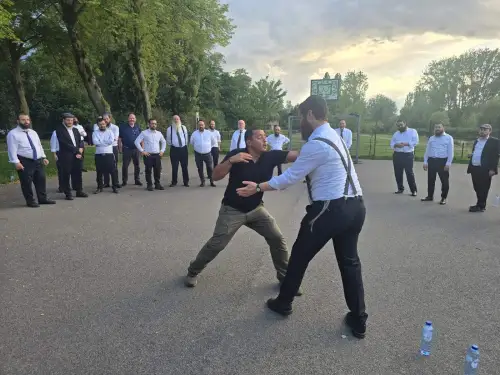 A guide trains rabbis in krav maga in Eindhoven, the Netherlands on July 22, 2025. Photo credit: RCE.