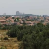 Hashmonaim from the north, with Modi’in in the background. Credit: Wikimedia Commons.