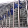 E.U. flags in front of the European Commission building in Brussels. Credit: Amio Cajander via Wikimedia Commons.