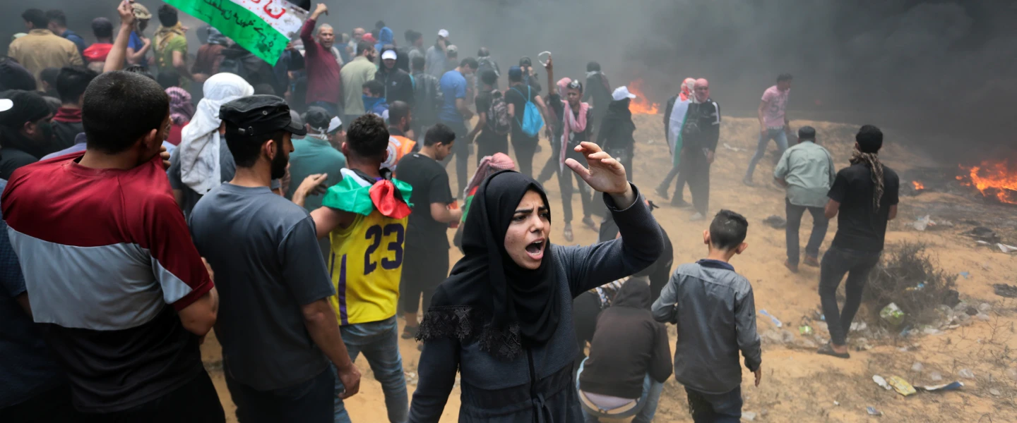 Palestinian protesters clash with Israeli forces near the Gaza-Israel border on May 14, 2018. Credit: Abed Rahim Khatib/Flash90.