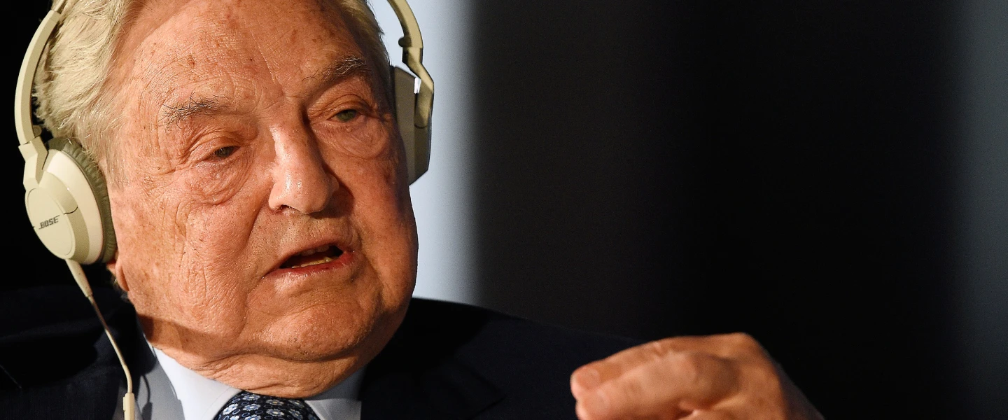 George Soros, the Hungarian-born American billionaire, investor and philanthropist, speaks during a political and financial meeting in Italy in 2014. Credit: Giacomo Morinini/Shutterstock.