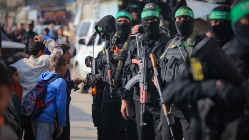 Members of the Hamas's Al-Qassam Brigades attend the funeral of Hamas military council member Ghazi Abu Tamaa, in Al-Hajj Musa Mosque in Khan Yunis, the southern Gaza Strip, Feb. 4, 2025. Photo by Ali Hassan/Flash90.
