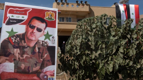A poster of Syrian President Bashar Assad, Oct. 6, 2018. Photo by Basel Awidat/Flash90.