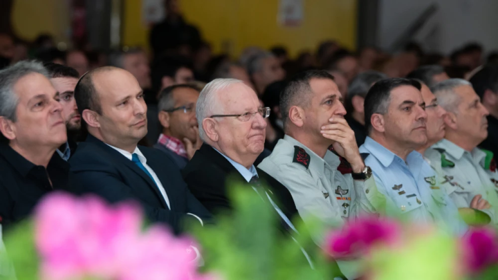 From left: Israeli Defense Minister Naftali Bennett, President Reuven Rivlin and IDF Chief of Staff Lt. Gen. Aviv Kochavi attend a ceremony in northern Israel marking the 23rd anniversary of the 1997 Israeli helicopter disaster, in which 73 IDF soldiers died, Feb. 11, 2020. Photo by Basel Awidat/Flash90.