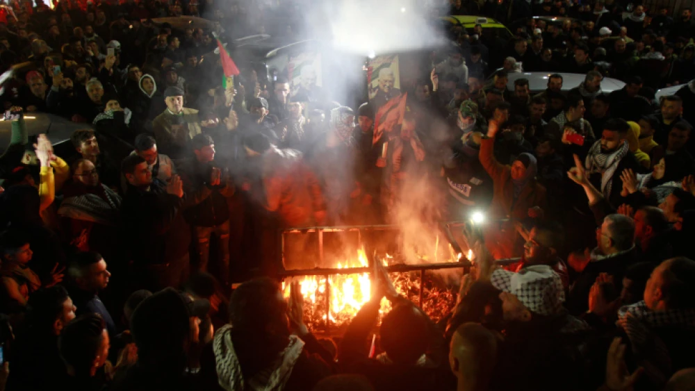 Palestinians burn images of U.S. President Donald Trump during a protest against the U.S. Middle East peace plan in the West Bank city of Nablus on Jan. 28, 2020. Photo by Nasser Ishtayeh/Flash90.