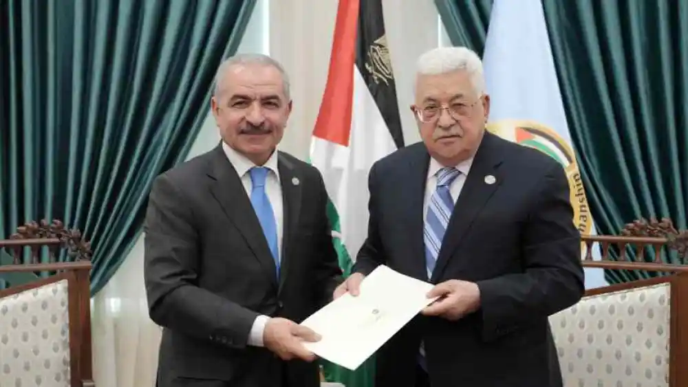 Mohammed Shtayyeh (left) accepts the position of prime minister of the Palestinian Authority from P.A. leader Mahmoud Abbas. Shtayyeh took office on April 14, 2019. Credit: JCPA.