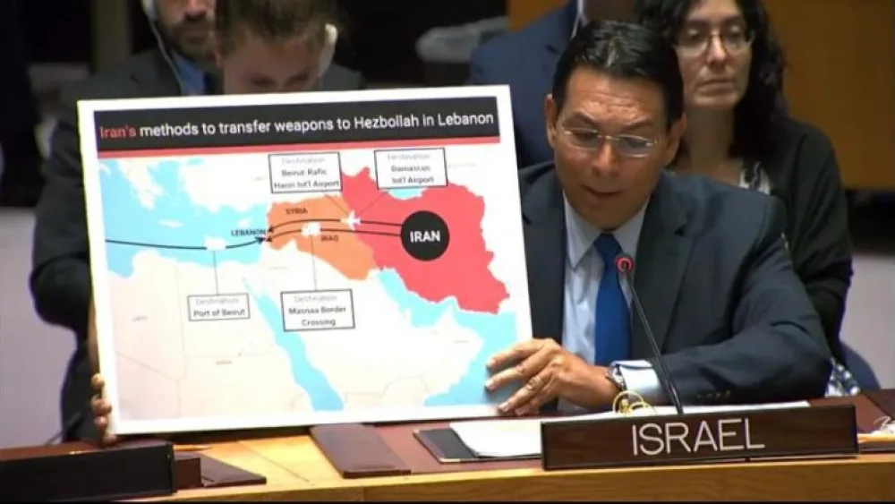 Israeli Ambassador to the United Nations Danny Danon shows a map marking some of the routes used by Iran to arm Hezbollah in Lebanon, at U.N. headquarters in New York on July 23, 2019. Credit: Israeli Mission to the United Nations.