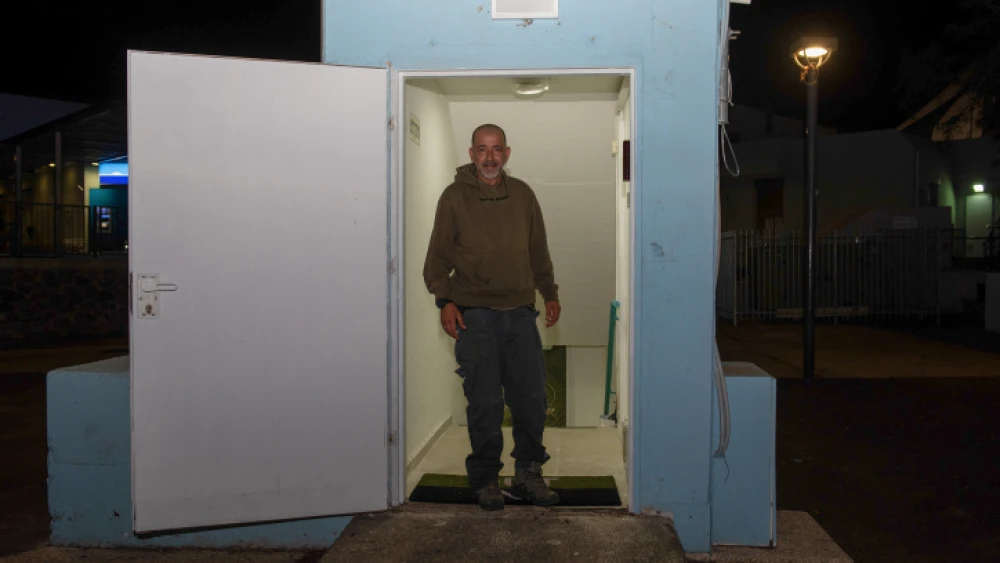 A man seen at the entrance to a bomb shelter in the Golan Heights in northern Israel on May 8, 2018, following an Israeli-army order to open area bomb shelters. Photo by Basel Awidat/Flash90.