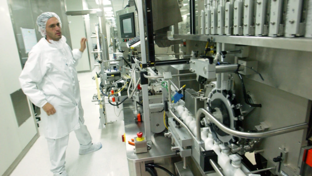 An Engineer watches over a production line at the Teva Pharmaceutical Industries plant in Jerusalem, Israel, on July 5, 2007. Photo by Olivier Fitoussi/Flash90.