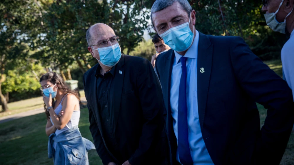 Jerusalem Affairs and Heritage Minister Rafi Peretz (right) and Knesset member Moshe Ya’alon at a protest outside the Knesset, calling for the release of the remains of IDF soldiers Oron Shaul and Hadar Goldin from Hamas captivity. July 1, 2020. Photo by Yonatan Sindel/Flash90.