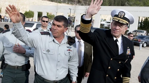 Click photo to download. Caption: Israeli Defense Forces Lt. Gen. Gabi Ashkenazi and Chairman of the Joint Chiefs of Staff Adm. Mike Mullen, U.S. Navy, wave to onlookers at the Yad Vashem Holocaust Memorial Museum in Jerusalem on Feb. 15, 2010. Credit: U.S. Navy.