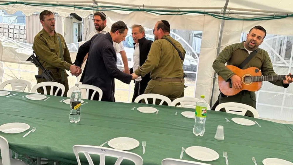 OU Israel Executive Director Rabbi Avi Berman, OU Executive Vice President and COO Rabbi Dr. Josh Joseph, and OU National Vice President Eli Levitin dancing with soldiers at Tziporit army base. Credit: Courtesy of the Orthodox Union.