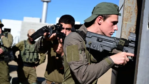 Infantrymen frrom the Golani Brigade's 51st Battalion train in underground tunnel urban warfare at a mock Arab village on the Golan Heights before heading to Gaza, May 15, 2021. Photo by Michael Giladi/Flash90.