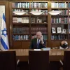 Israeli Prime Minister Benjamin Netanyahu on the phone with U.S. President Donald Trump and UAE Sheikh Mohammed bin Zayed Al Nahyan on Aug. 13, 2020. Credit: Kobi Gideon/GPO.