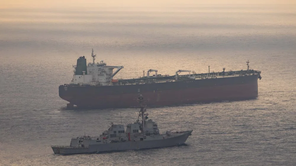 Guided-missile destroyer USS Rafael Peralta (DDG 115) enforces the U.S. blockade against an Iranian-flagged ship attempting to sail to a port in Iran, on April 24, 2026. Credit: U.S. Central Command.