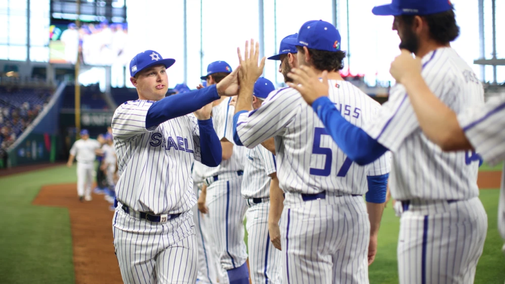 Joc Pederson (left) of Team Israel congratulates teammates after beating Nicaragua in a come-from-behind win at the World Baseball Classic on March 12, 2023. Credit: Courtesy of Major League Baseball.