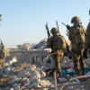 Israeli soldiers operate amid rubble in the Gaza Strip. Credit: IDF.