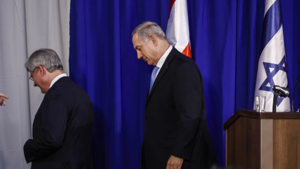 Click photo to download. Caption: Canadian Prime Minister Stephen Harper (left) and Israeli Prime Minister Benjamin Netanyahu exit a joint press conference in Jerusalem in January 2014. In Canada, Harper will now exit his prime minister post as well. Credit: Flash90.
