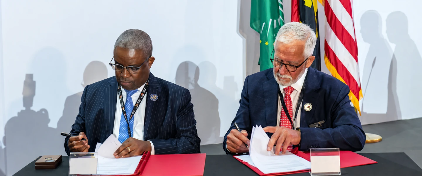 Haim Taib and Armando Manuel, chairman of Angola’s Sovereign Wealth Fund, at the signing of a $1 billion Lobito Corridor development initiative during the U.S.-Africa Business Summit in Luanda, Angola, in June 2025. Credit: Mitrelli.