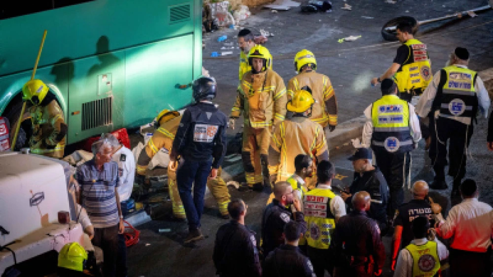 Police and rescue personnel at the scene of where a bus lost control and plowed into a bus station in central Jerusalem, killing three people, Aug. 11, 2022. Photo by Yonatan Sindel/Flash90.