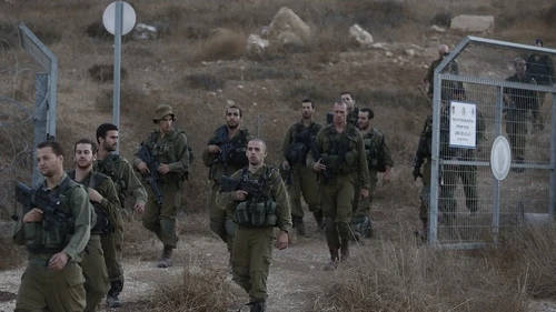 Click photo to download. Caption: Israeli soldiers are seen after searching for the remains of a drone in the Negev southern Israel on Oct. 6, 2012. Israeli jets scrambled to intercept a drone that crossed into Israeli airspace from the Mediterranean Sea, bringing it down without incident in the south of the country. Credit: Tsafrir Abayov/Flash90