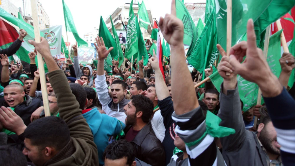 Palestinian supporters of Hamas attend a rally marking the 25th anniversary of the Islamist movement's founding, in the West Bank town of Ramallah, Dec. 14, 2012. Photo by Issam Rimawi/Flash90.